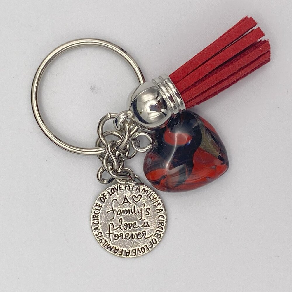 Heart keychain with engraved charm.